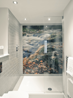 Superior room wet room shower with photographic mural on wall of nature scene and grey tiles